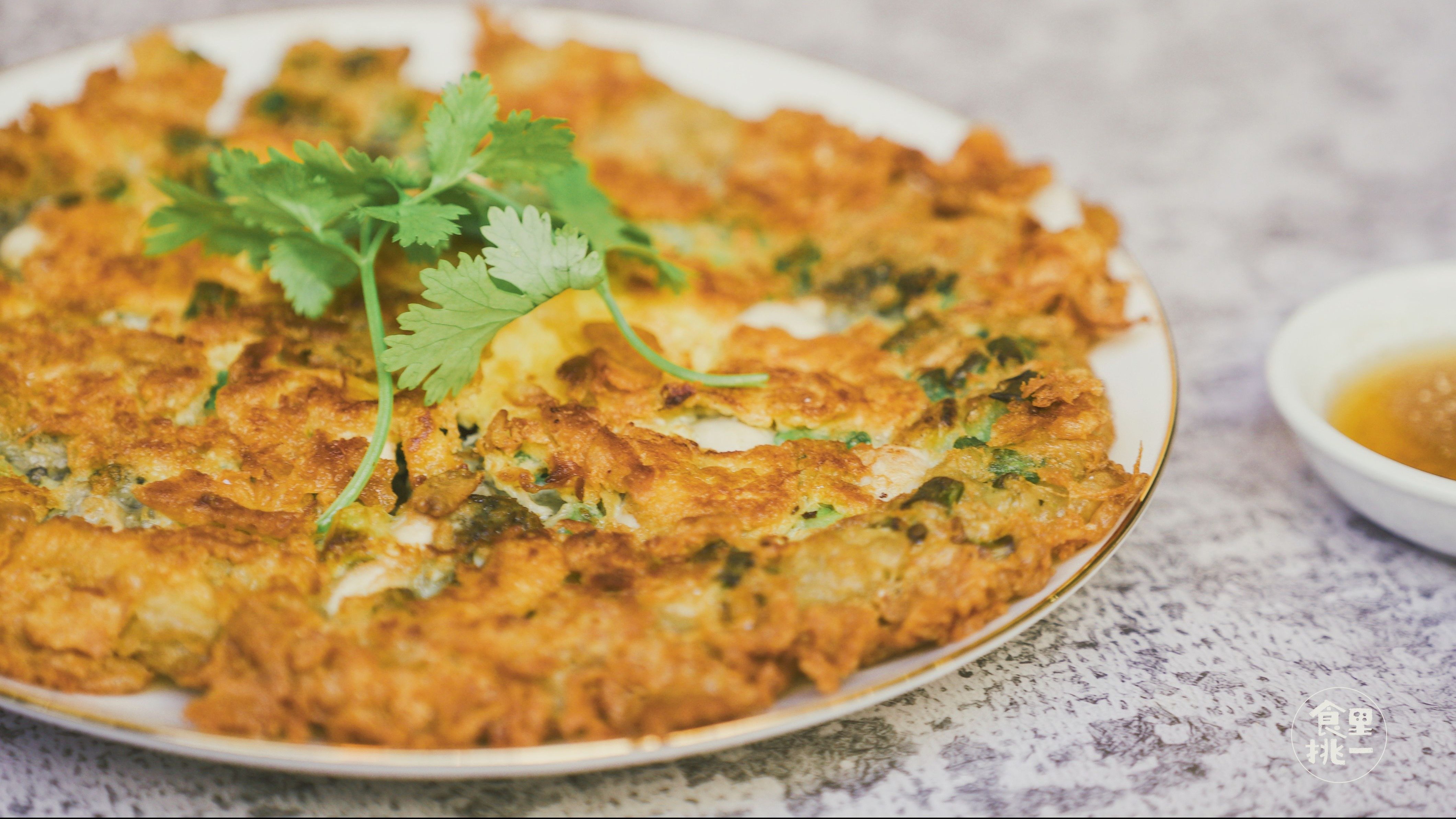 蚵仔煎素有"台湾小吃第一"的美誉,我们一起走进台湾蚵仔产量最多的