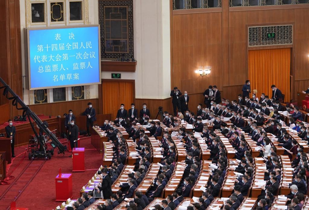 现场图集:十四届全国人大一次会议举行第三次全体会议