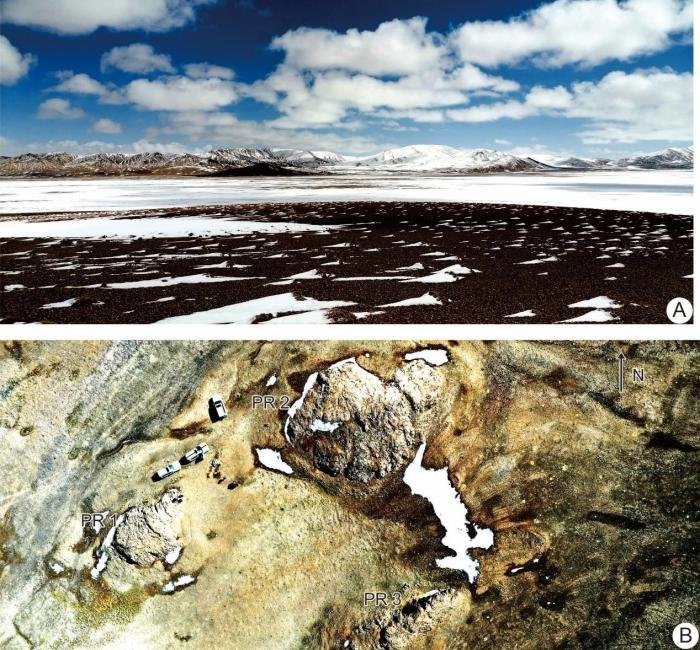 西藏阿里拉竹龙-邦达错地区兽形湖附近野外照片和中泥盆世点礁鸟瞰图。　南古所 供图