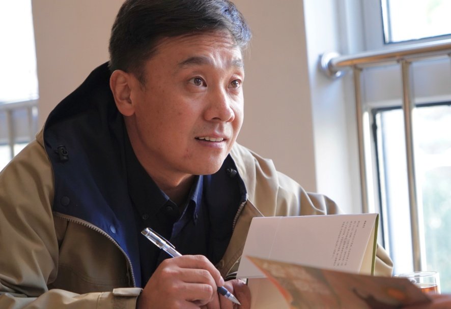 索南才让对新西善的故事充满好奇。