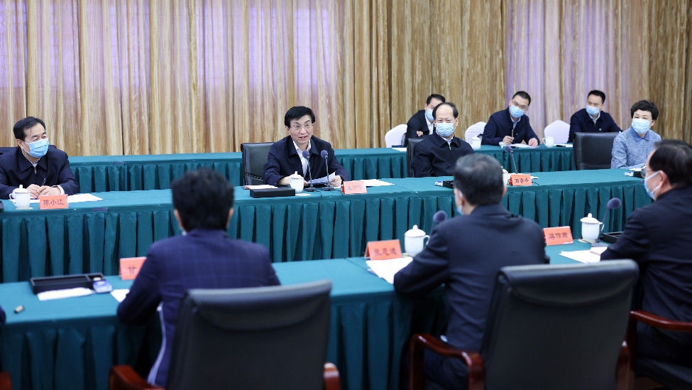 3月23日,王沪宁走访致公党中央。新华社记者 刘彬 摄