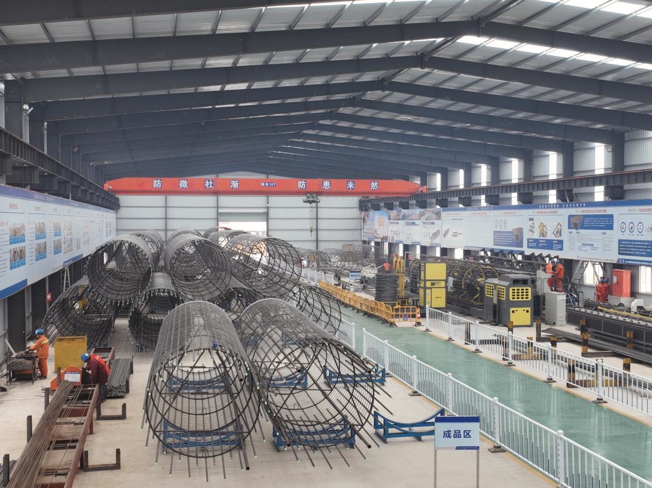 图为钢筋笼一体化自动生产线