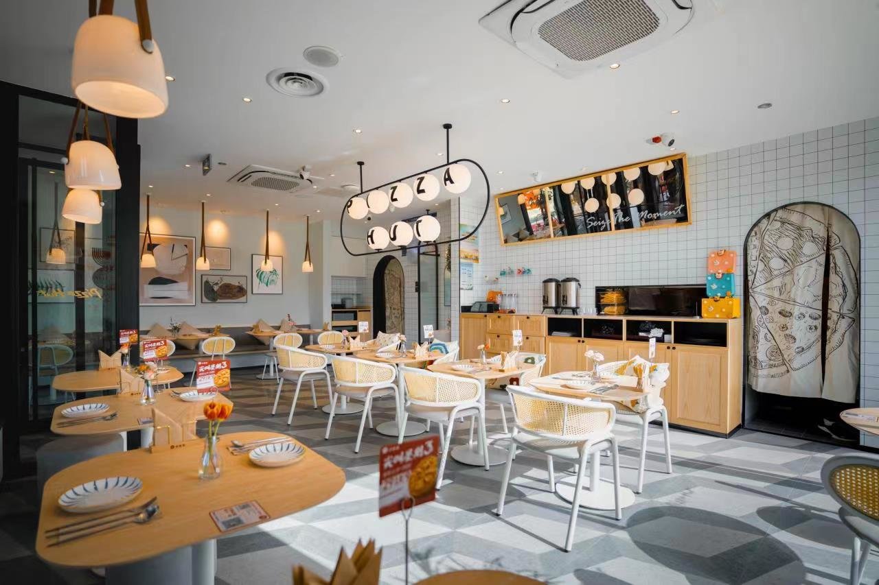 在豫首家同时入驻 肯德基、必胜客校园餐厅落户郑州科技学院