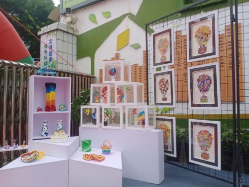 展区,孩子们以"衍"绎精彩,"纸"有快乐为主题,将衍纸艺术融入创作之中