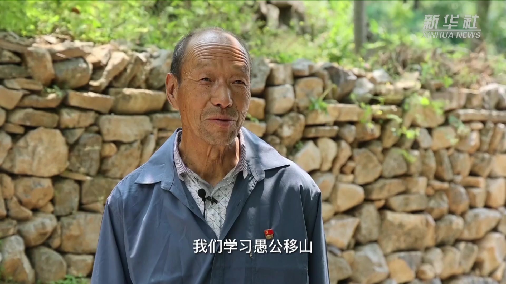 当代“愚公”凿山记：挂在峭壁上的公路