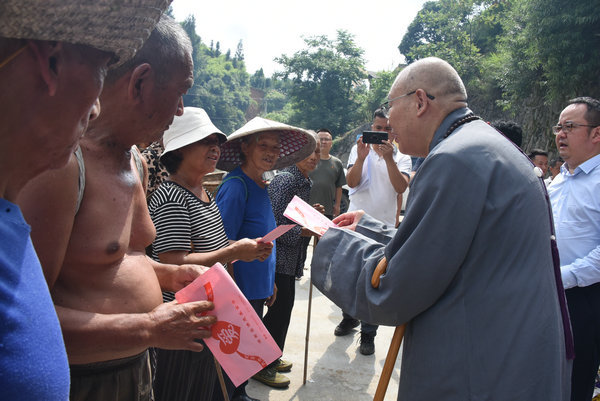 湖南佛慈2023慈善行第一站：圣輝長(zhǎng)老赴湘西古丈縣古陽(yáng)鎮(zhèn)大龍村洪災(zāi)賑濟(jì)