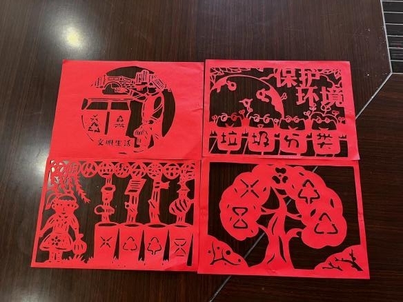 剪纸遇见垃圾分类 别出心“裁”迎亚运