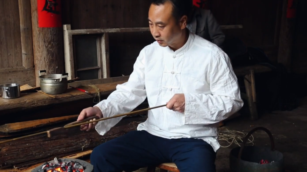 他用一把竹木弓传承传统射箭文化