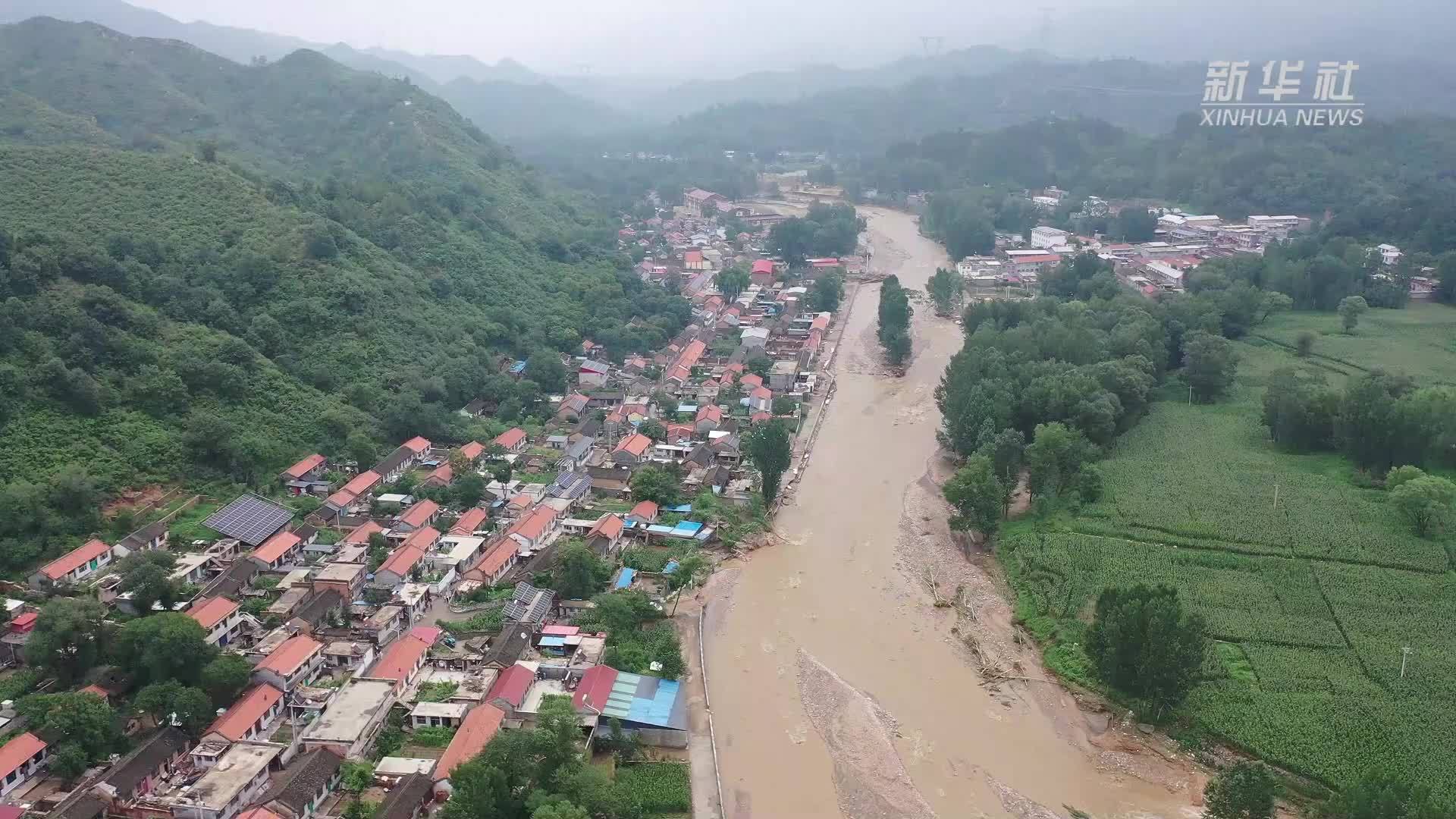 河北涞源：多方接力 洪水中为孕妇搭建“生命通道”