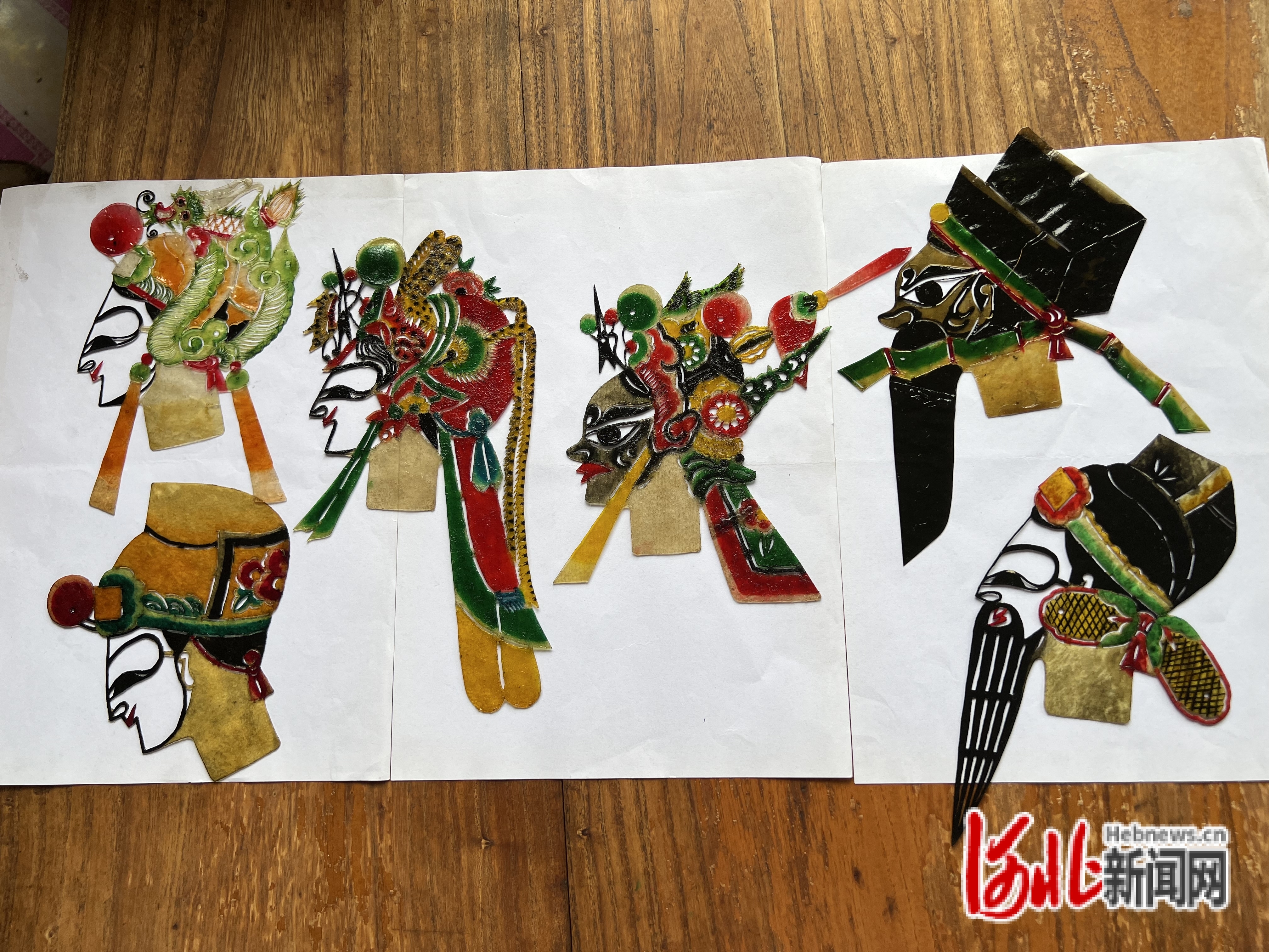 图为迁西县皮影手艺人赵连利创作的皮影作品。