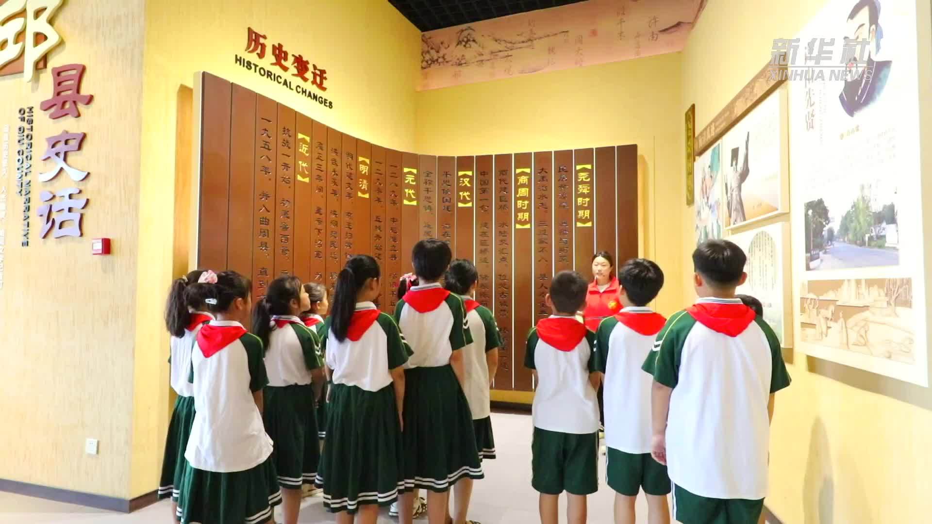 河北邱县：大学生志愿者点亮留守儿童多彩假期