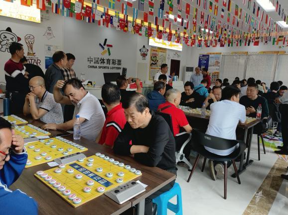 “好运‘弈棋’来” 体彩民间棋王争霸赛在江西七地海选赛正酣