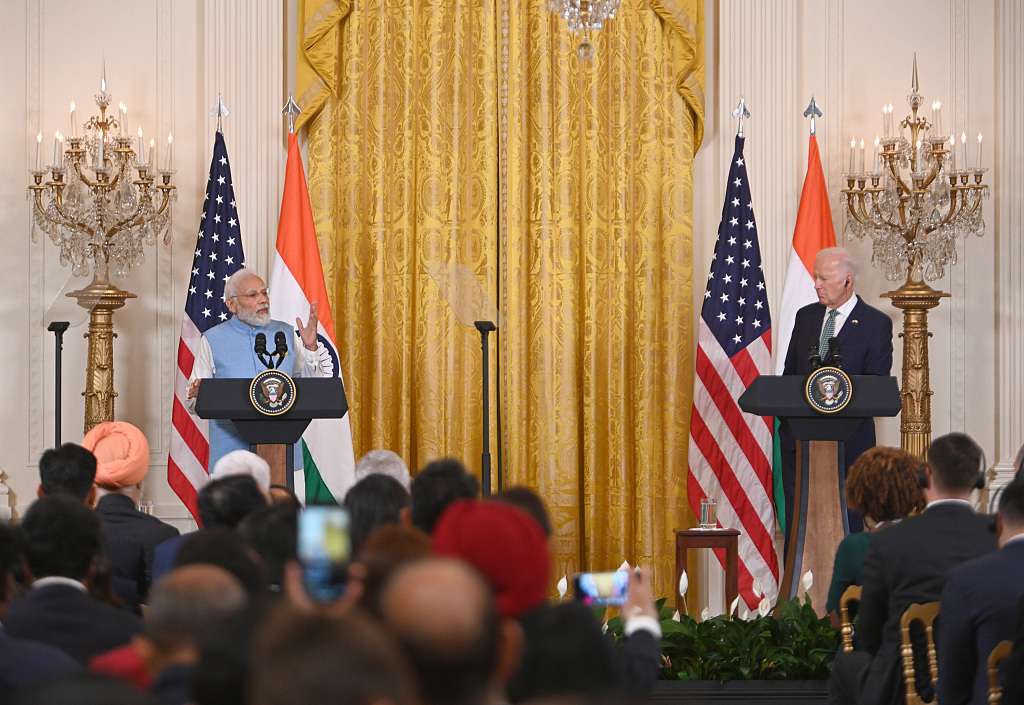 今年6月22日，美国总统拜登在白宫会晤来美进行国事访问的印度总理莫迪。图为双方在白宫出席联合记者会。（视觉中国）