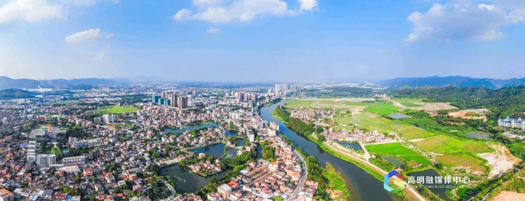 沧江河穿过明城。洪海摄