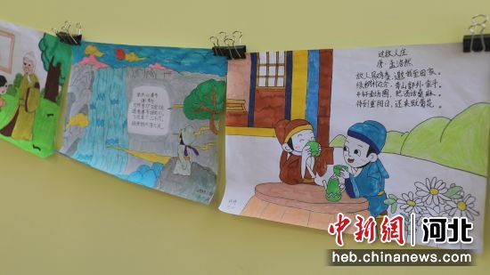 绘画社团活动室展出的古诗配图作品(部分)。 郭恩桥 摄