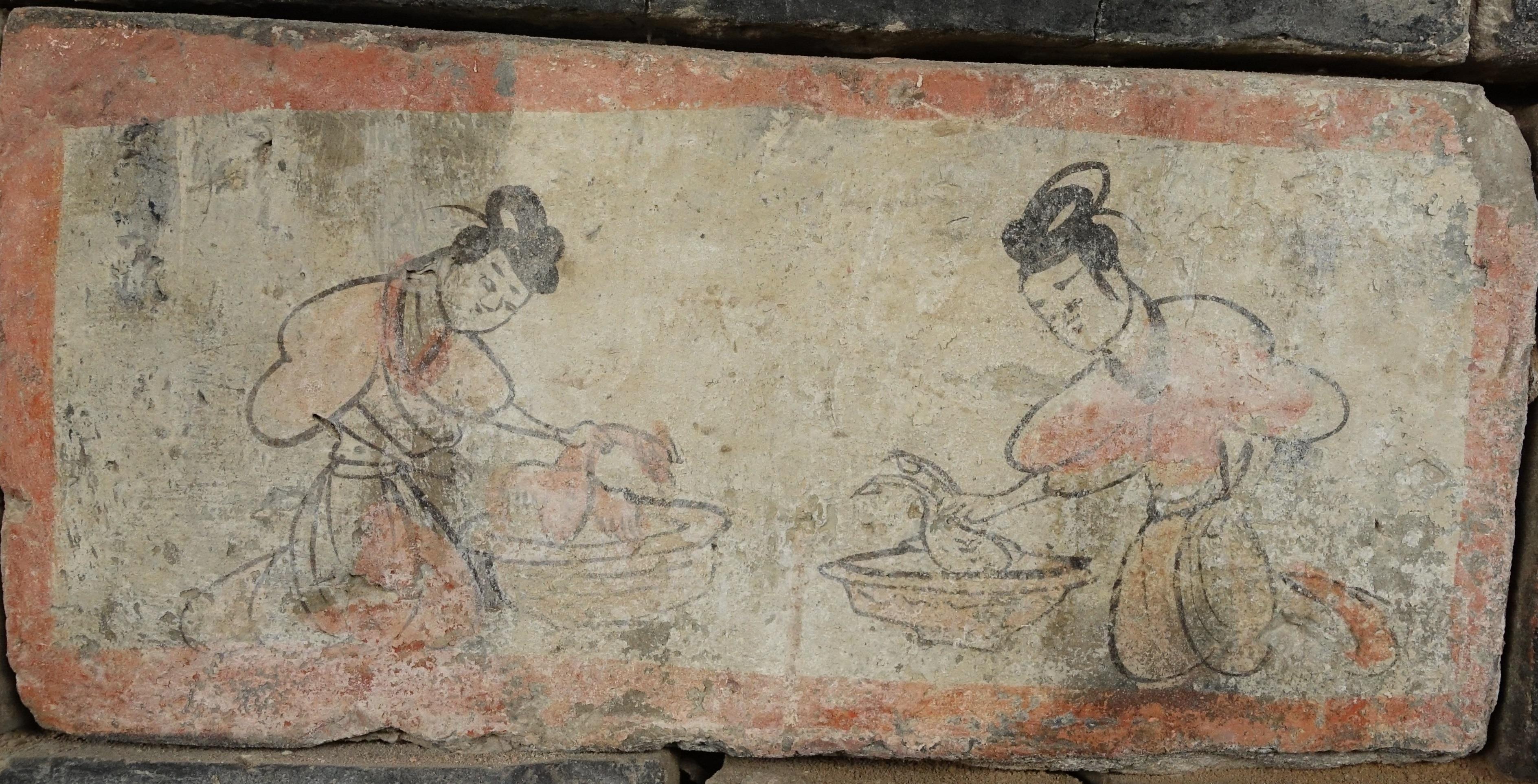 △“烫鸡图”壁画砖　甘肃省博物馆藏