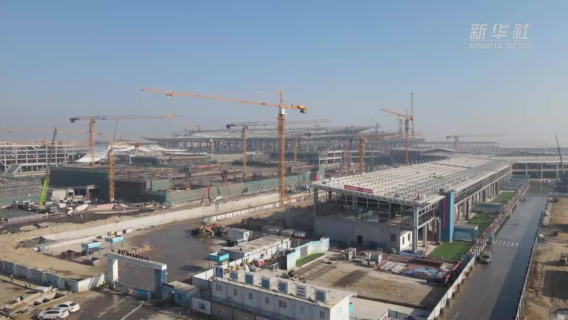 机场建设者：盼早日带家人来坐飞机