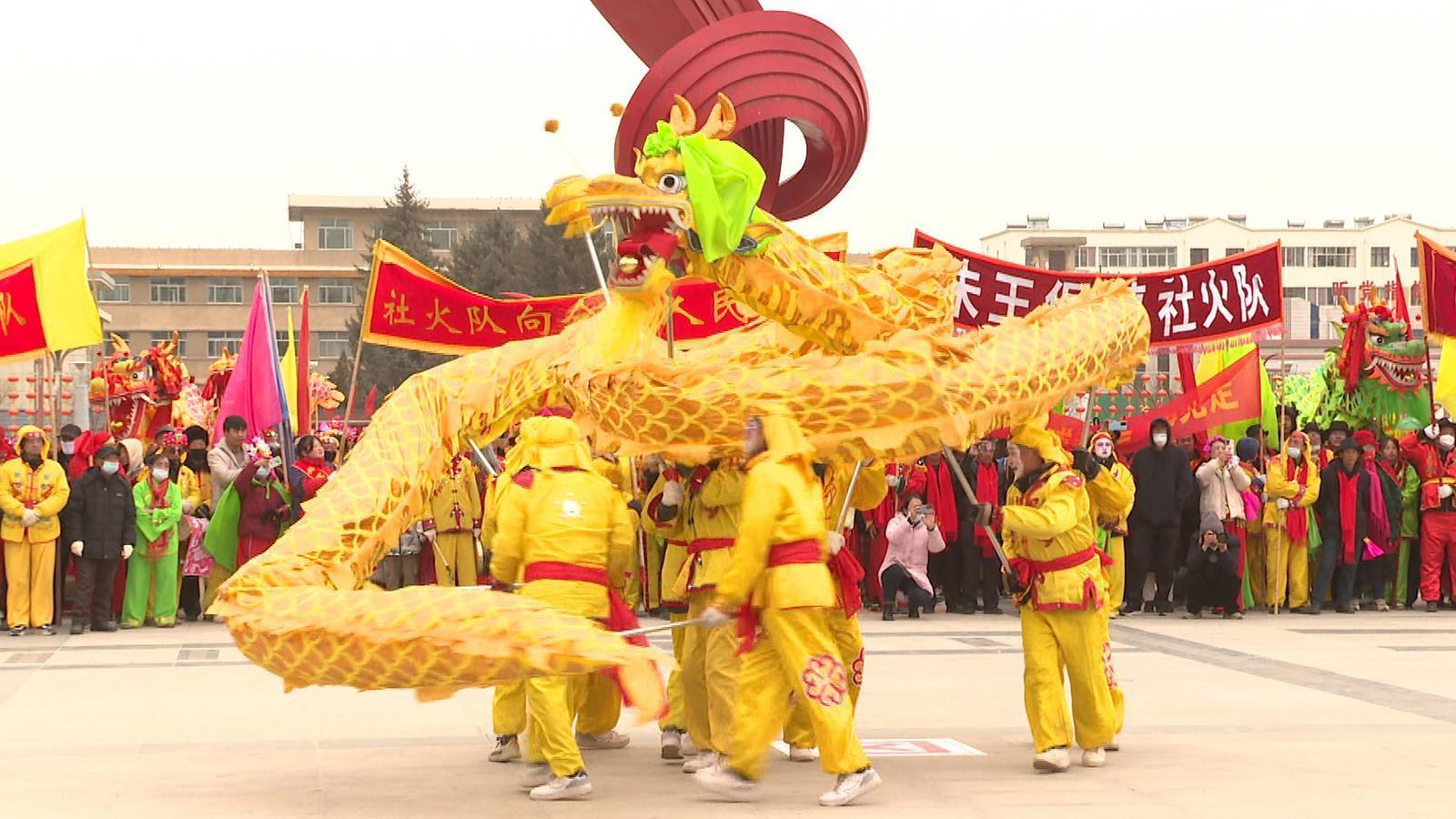 “社牛”驾到通通闪开……永昌锣鼓喧天年味“龙”