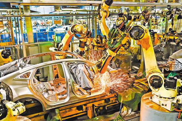 ▲近日,长安汽车两江工厂一派忙碌景象。王加喜 摄