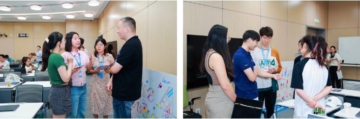 小组项目展示前一天,张驰(左图右一)和王欢(右图左二)与同学们讨论小组项目