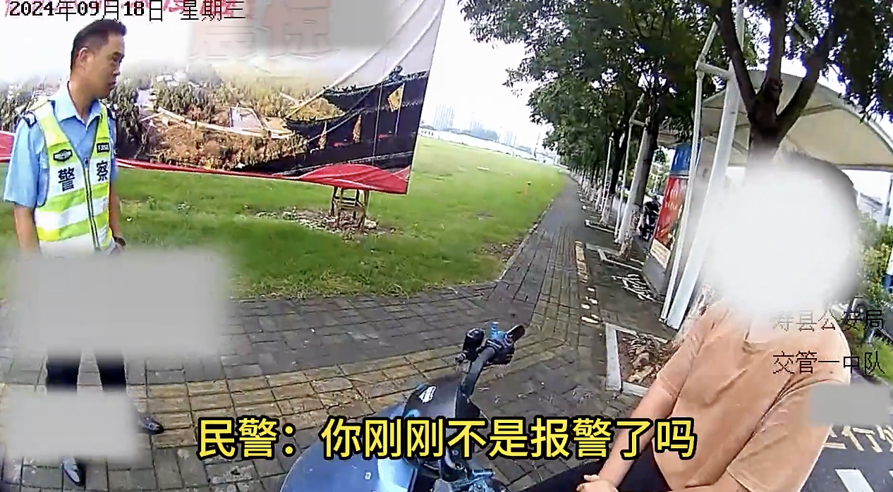 安徽一男子不戴头盔被查 现场要求报警？