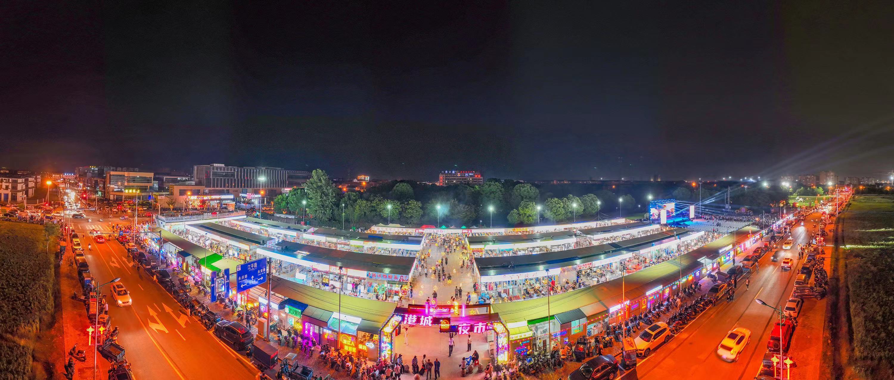 （图为“港城夜市”航拍图 盛义摄）