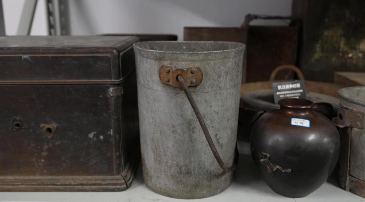 （铝桶被收入博物馆文物库房）