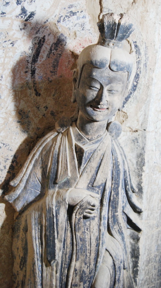 峭壁"雕塑馆"里讲了啥故事 北魏"东方微笑"美了千年