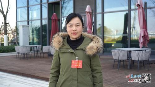 市人大代表、永新县城市社区管委会河东社区工作者王乐英