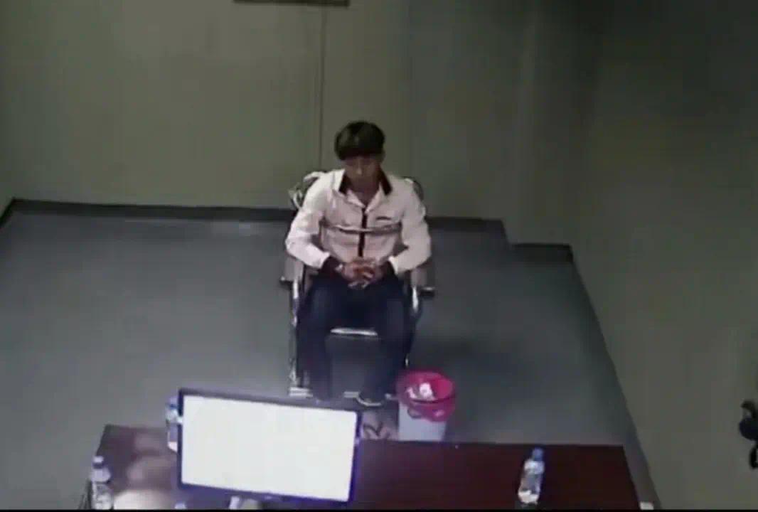 图 6年犯罪嫌疑程接受审讯