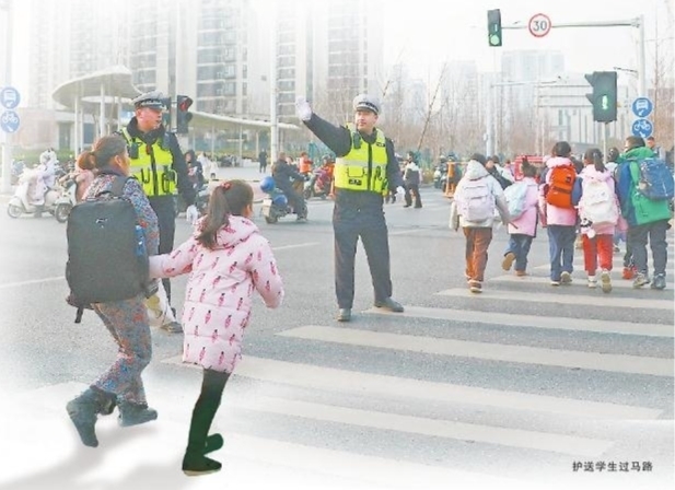 護送學生過馬路