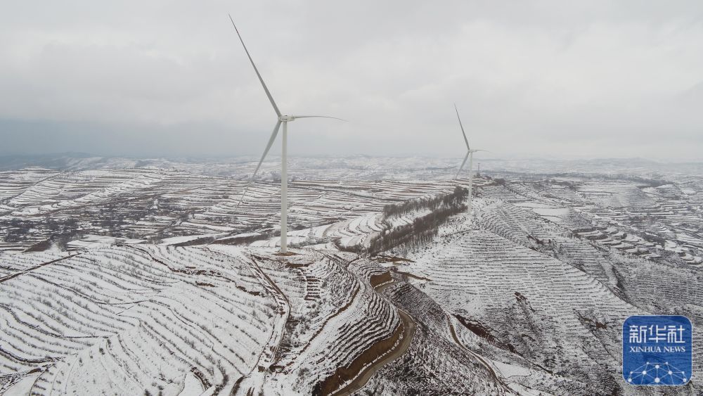 ↑这是3月14日在甘肃省定西市安定区拍摄的雪景（无人机照片）　新华社发（王克贤　摄）