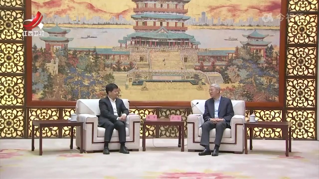 尹弘会见华为公司监事会主席郭平