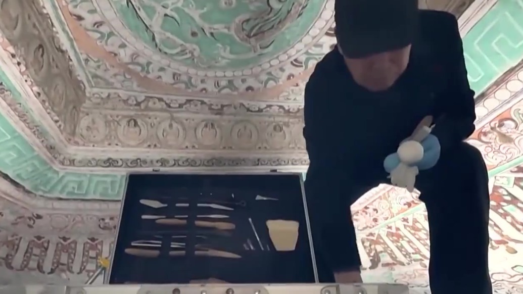 莫高窟里　毫厘之间坚守匠心