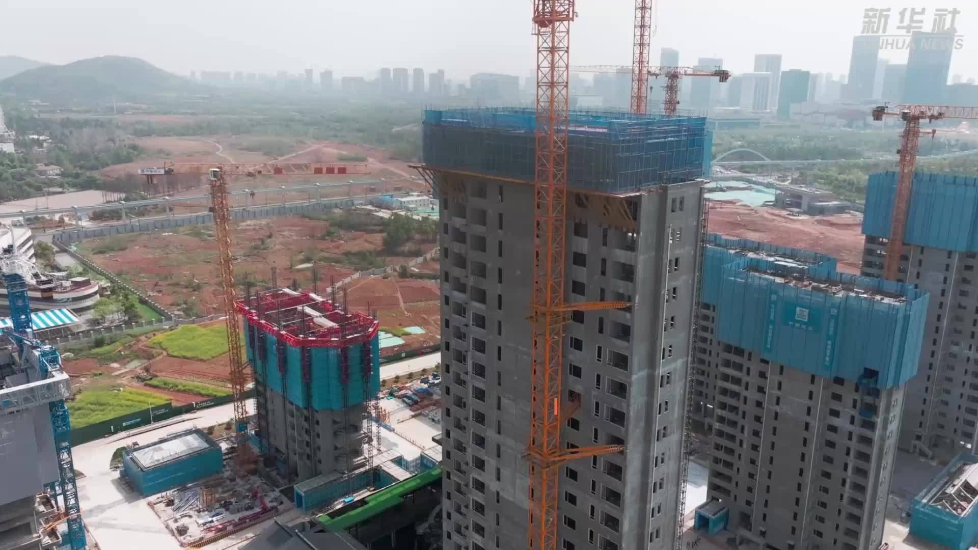 “造楼机”“机器人”组“搭子”助力建造“好房子”