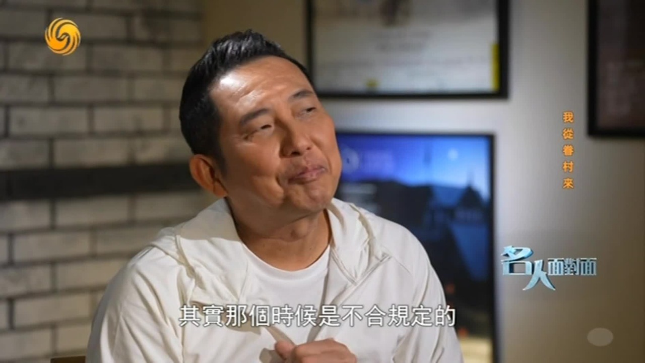 屈中恒：父亲常拿照片教我认亲人，直到1990年他才踏上回乡之路