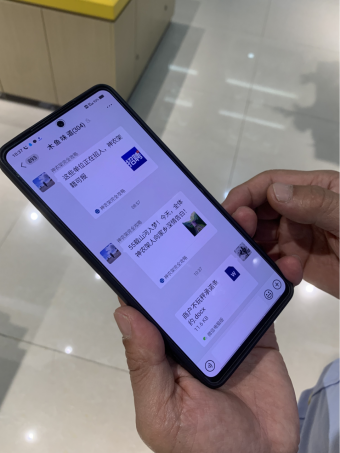 周立志在木鱼商户微信群里分享信息。