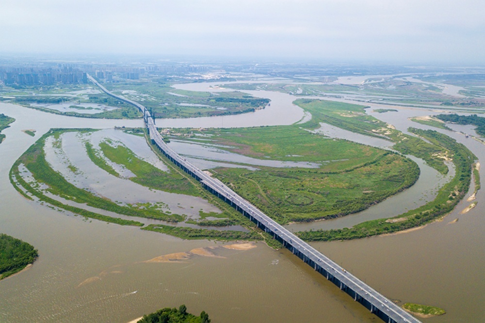 哈尔滨：十载守护湿地路 一城秀色半城景