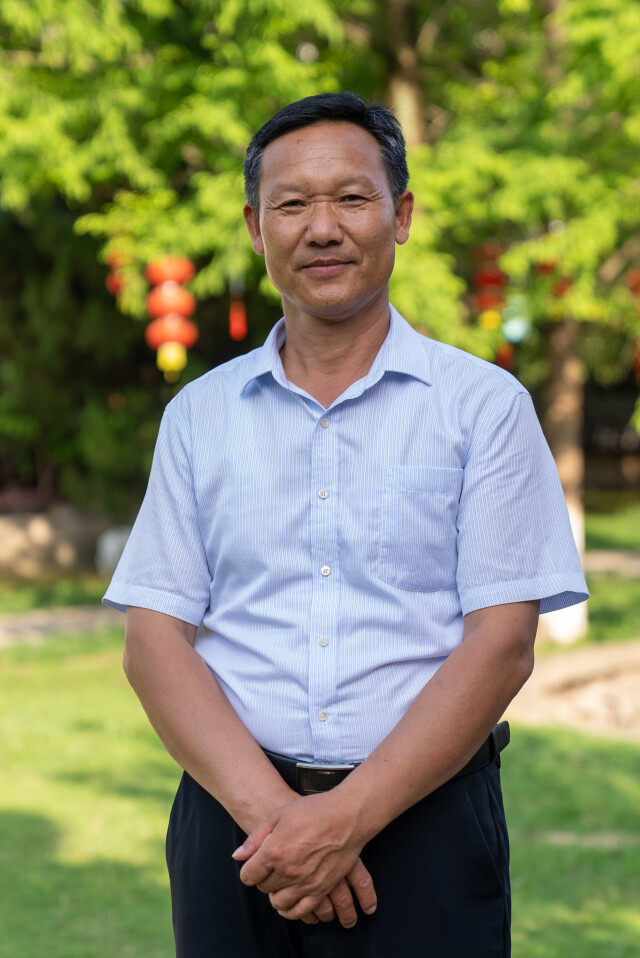 李白墓第49代守墓人谷常新。