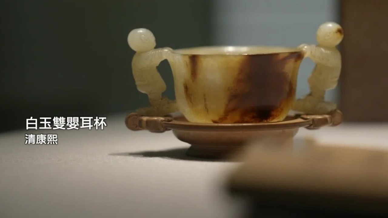 这件白玉双婴耳杯，凭借乾隆皇帝“看走眼”的趣闻，让人津津乐道