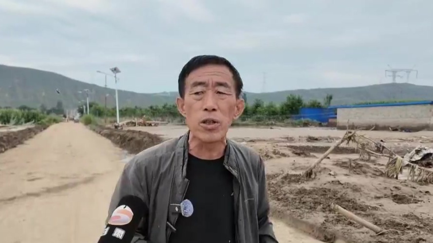 洪水中的逆行者：洪惠春用担当守护生命防线