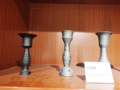 蛋壳杯器形薄如蛋壳,质地细腻坚硬。