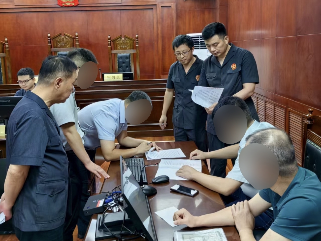 圖為組織簽訂調解協議