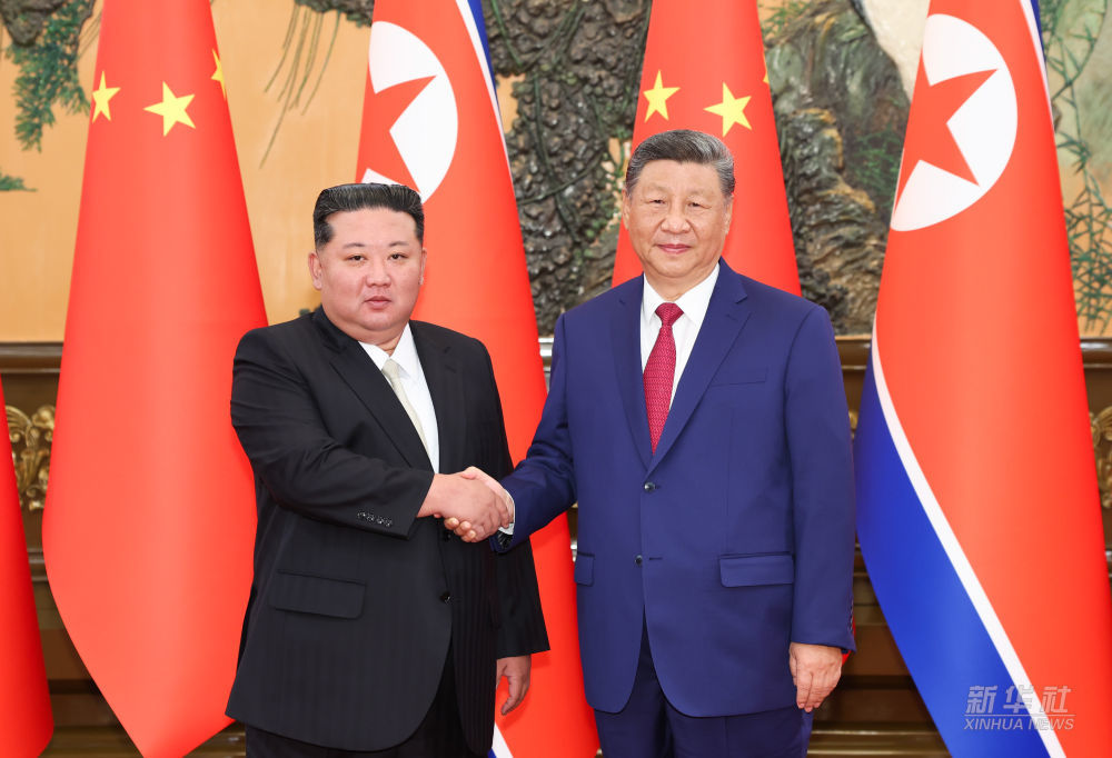 习近平同朝鲜劳动党总书记、国务委员长金正恩举行会谈