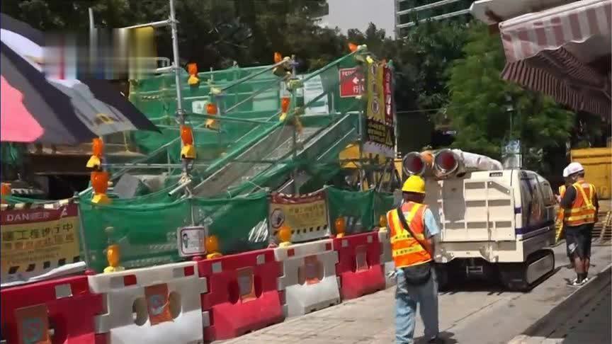 香港市民设沙袋挡水板应对超强台风，渠务署投入6部“龙吸水”