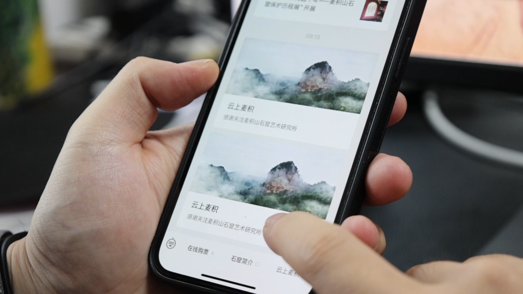 麦积山石窟乘“云”而上　“东方微笑”圈粉海内外游客