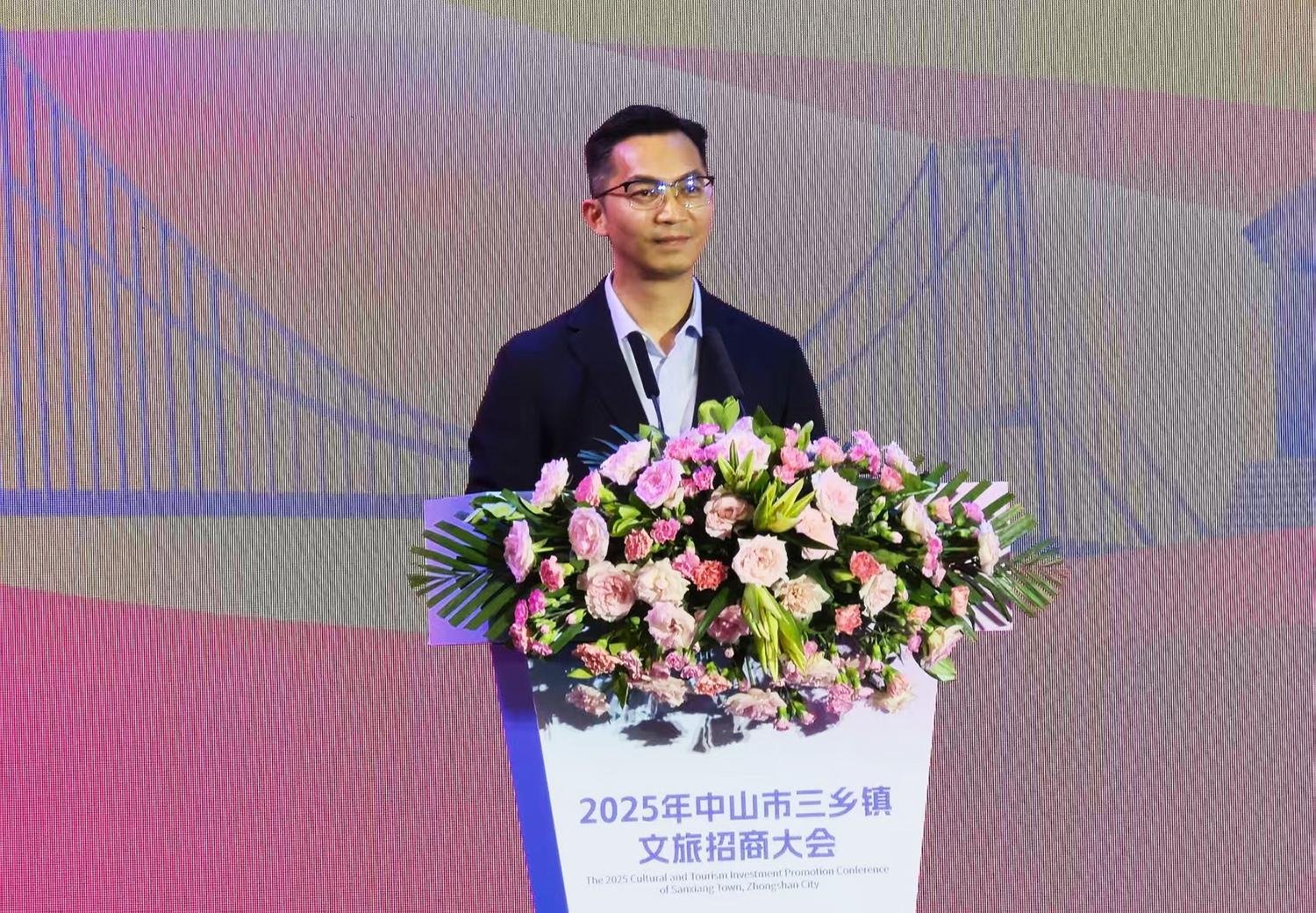 三乡镇党委书记冼智前发言