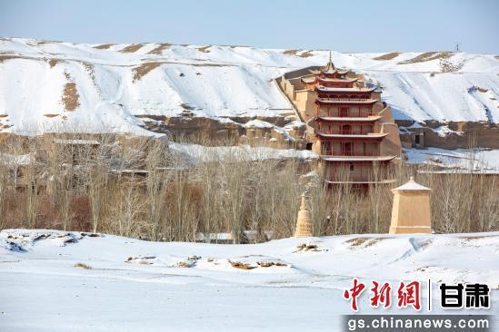 图为雪后的莫高窟（资料图）　敦煌市委宣传部供图