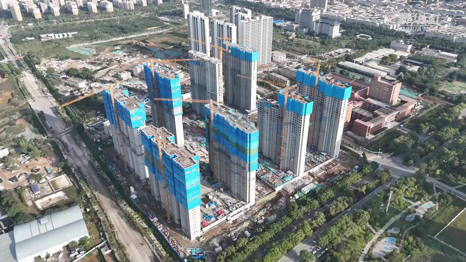 陕西：坚守施工一线 建设者工地过双节
