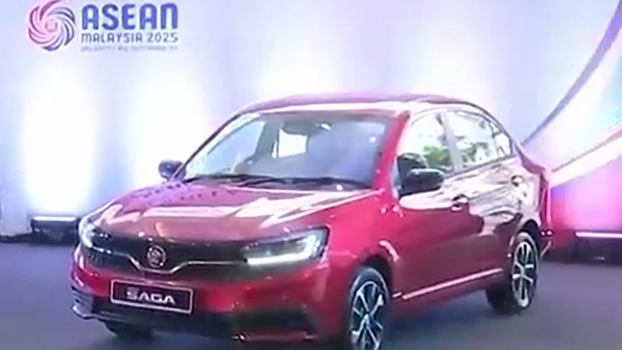 中马总理共同参观马来西亚首款电动汽车